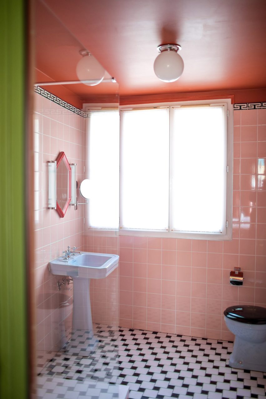 Tiled bathrooms inside Hotel Les Deux Gares in Paris
