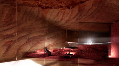 Hotel bedroom with sandstone walls