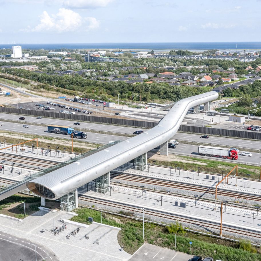 Cobe and Dissing+Weitling design futuristic footbridge for Køge Nord Station