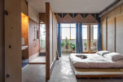 Master bedroom of La Nave apartment in Madrid by Nomos