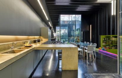 Concrete kitchen island in Lost House by David Adjaye