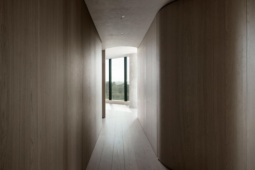The Melburnian Apartment by Edition Office features oak storage volumes