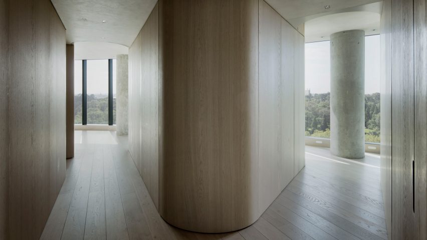 The Melburnian Apartment by Edition Office features oak storage volumes