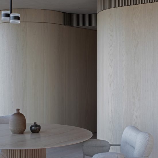 The Melburnian Apartment by Edition Office features oak storage volumes