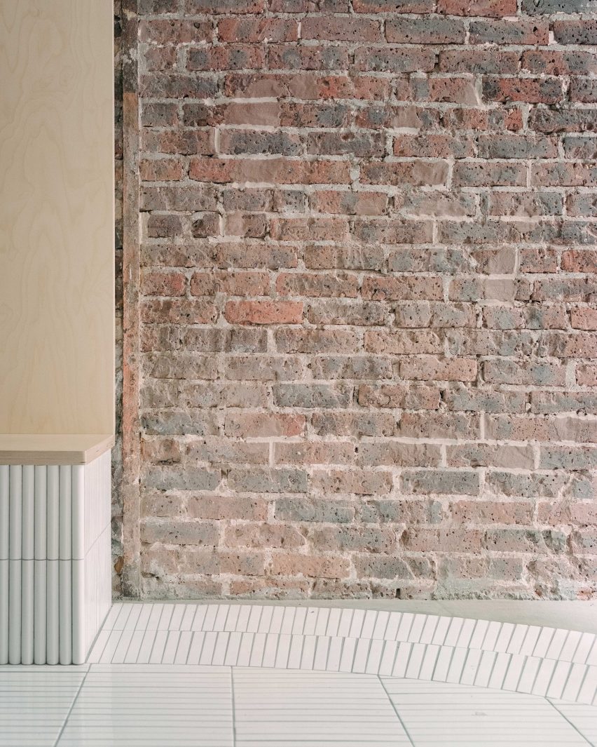 Exposed brick walls feature inside Papi restaurant in Paris