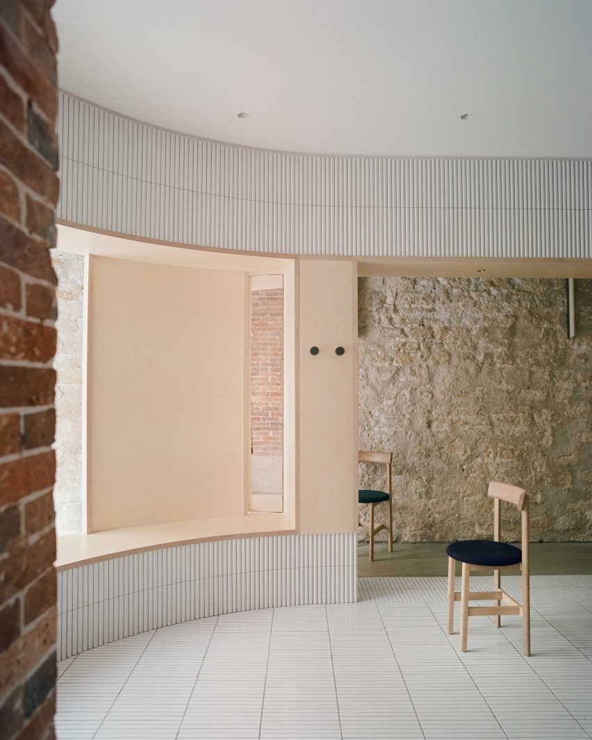 White tiles cover dining area of Papi restaurant in Paris
