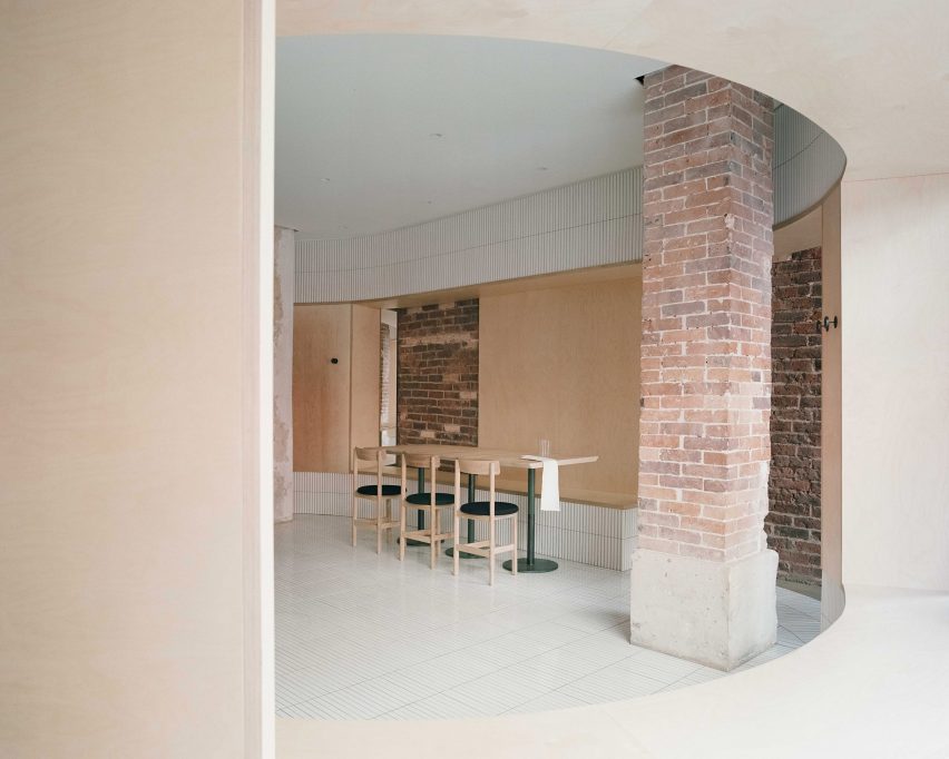 White tiles cover dining area of Papi restaurant in Paris