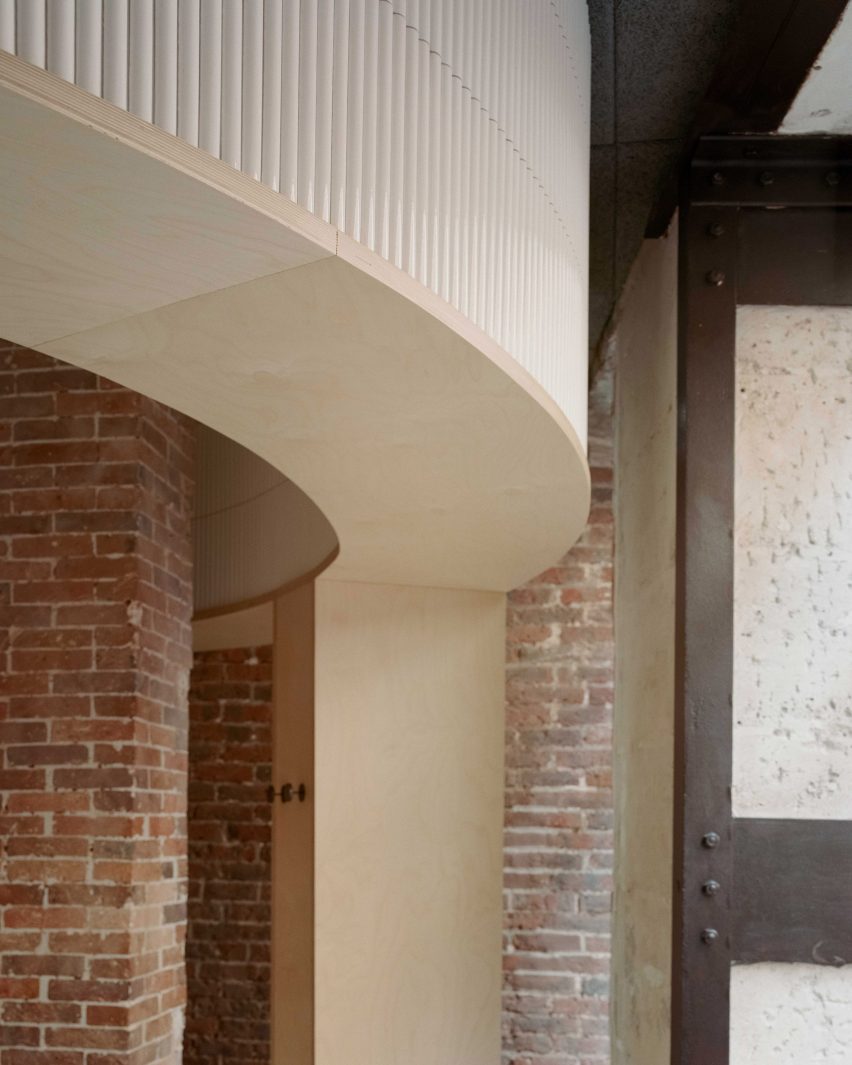 Exposed brick walls feature inside Papi restaurant in Paris