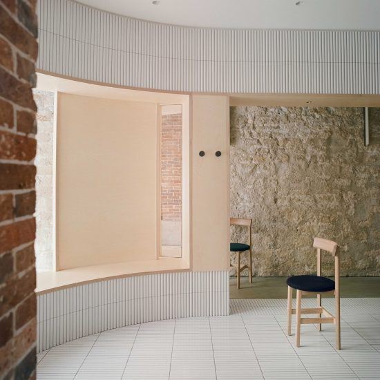 White tiles cover dining area of Papi restaurant in Paris