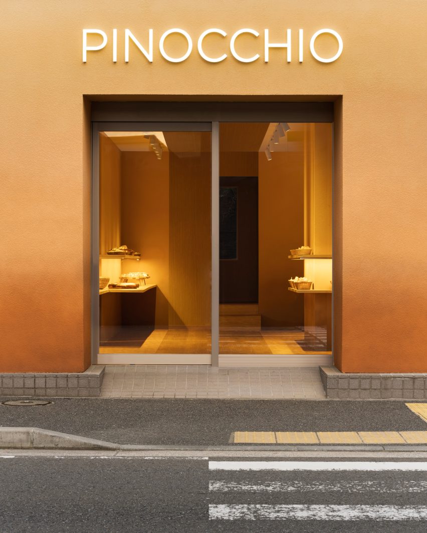 Doorway of Pinocchio tiny bakery in Japan by I IN