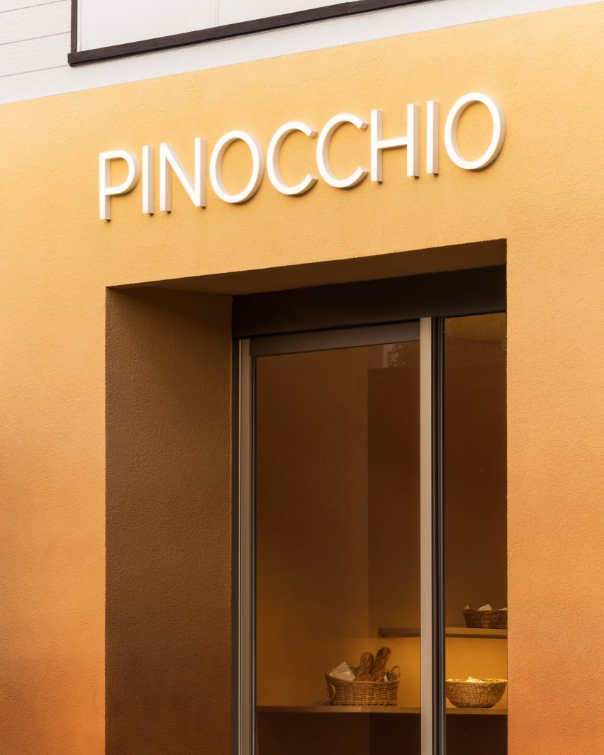 Sign for Pinocchio tiny bakery in Japan by I IN