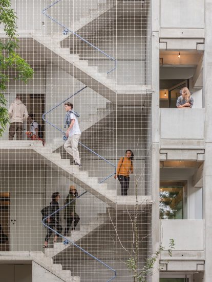 Zigzag external staircase of Wohnregal, a prefabricated concrete housing block by FAR in Berlin, Germany