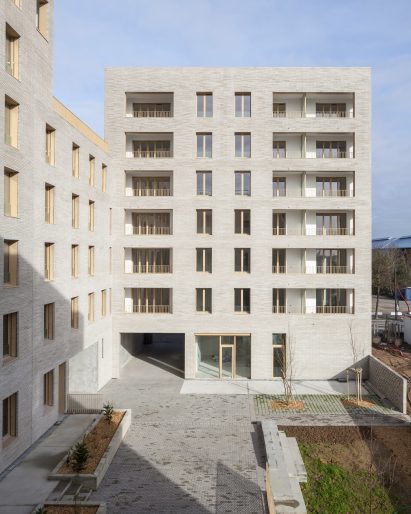 Brick facade of Zellige housing in Nantes, France, by Tectône and Tact Architectes