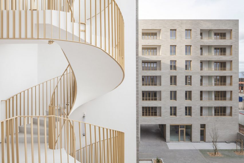 Spiral staircase of Zellige housing in Nantes, France, by Tectône and Tact Architectes