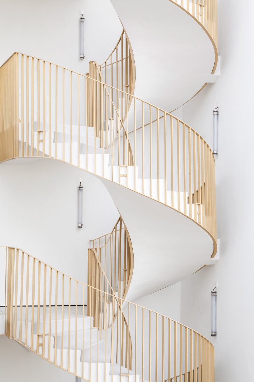 Spiral staircase of Zellige housing in Nantes, France, by Tectône and Tact Architectes