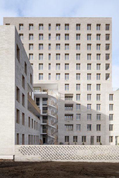 Brick facade of Zellige housing in Nantes, France, by Tectône and Tact Architectes