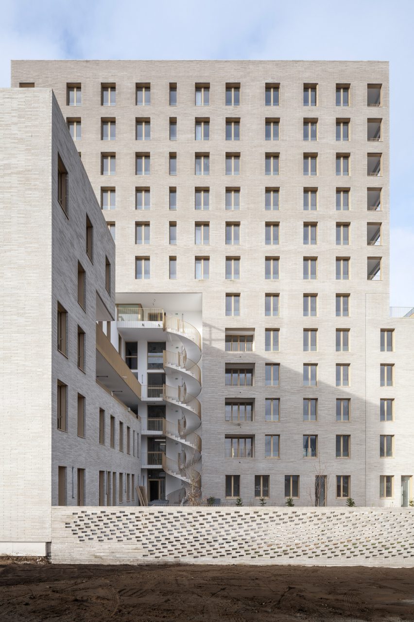 Brick facade of Zellige housing in Nantes, France, by Tectône and Tact Architectes