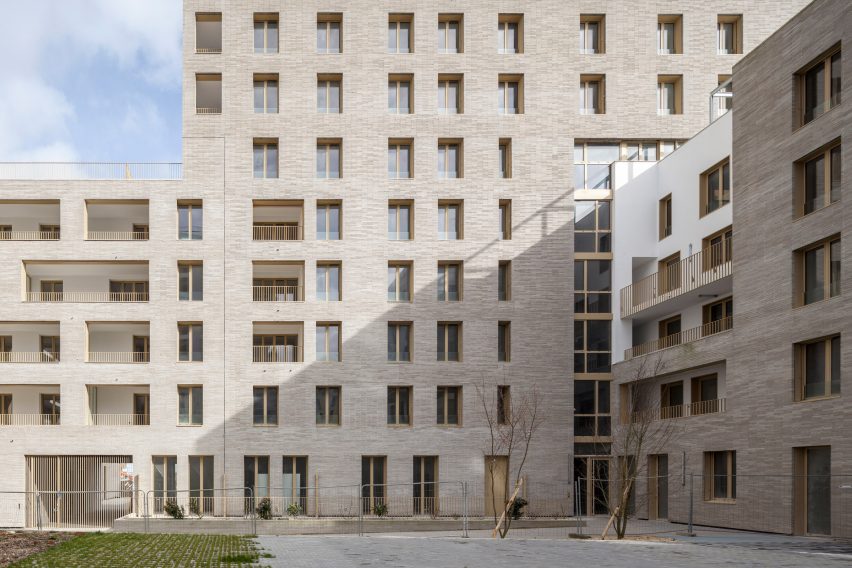 Brick facade of Zellige housing in Nantes, France, by Tectône and Tact Architectes