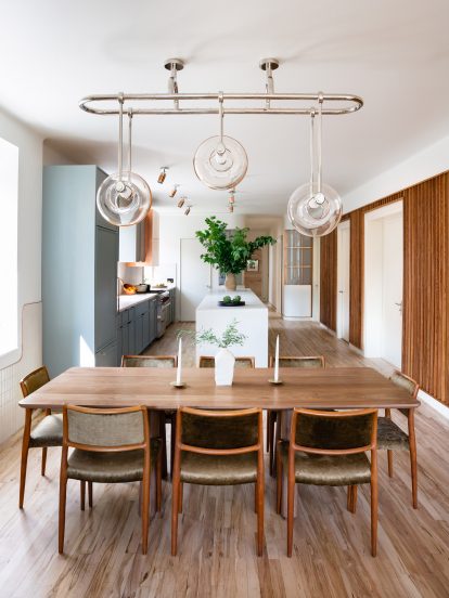 Dining area of 20 Bond apartment by Home Studios