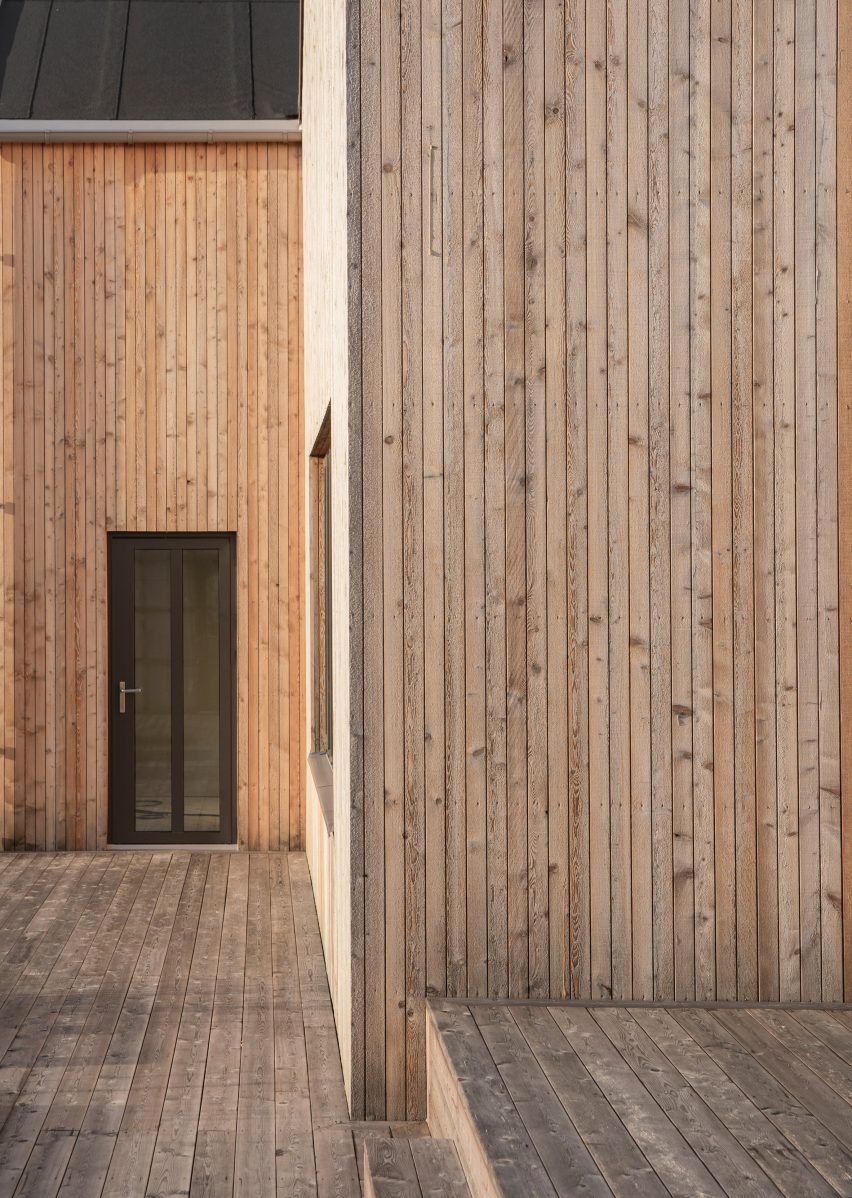 Exterior of Archipelago House by Norm Architects is line with pine wood
