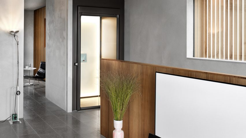 Aritco Homelift by Aritco includes backlit wall that displays artwork