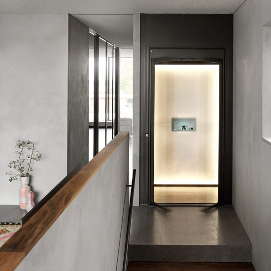 Aritco Homelift by Aritco includes backlit wall that displays artwork