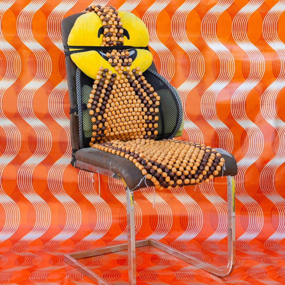 Al Khat Al Thahabi Auto Accessories & Upholstery chair from How to be at Rest installation by Christopher Benton