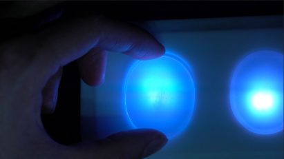 The Dots system comprises two white discs with embedded sensors