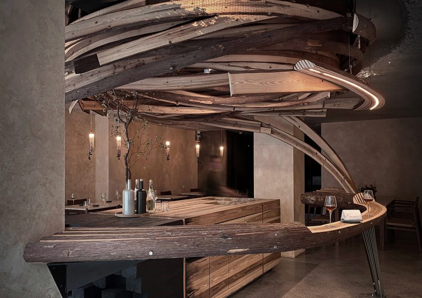 Interior of Embers restaurant in Taipei has nest-like sculpture made from cedar wood
