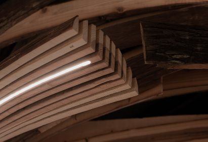 Interior of Embers restaurant in Taipei has nest-like sculpture made from cedar wood