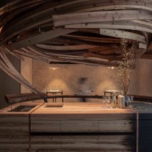 Interior of Embers restaurant in Taipei has nest-like sculpture made from cedar wood