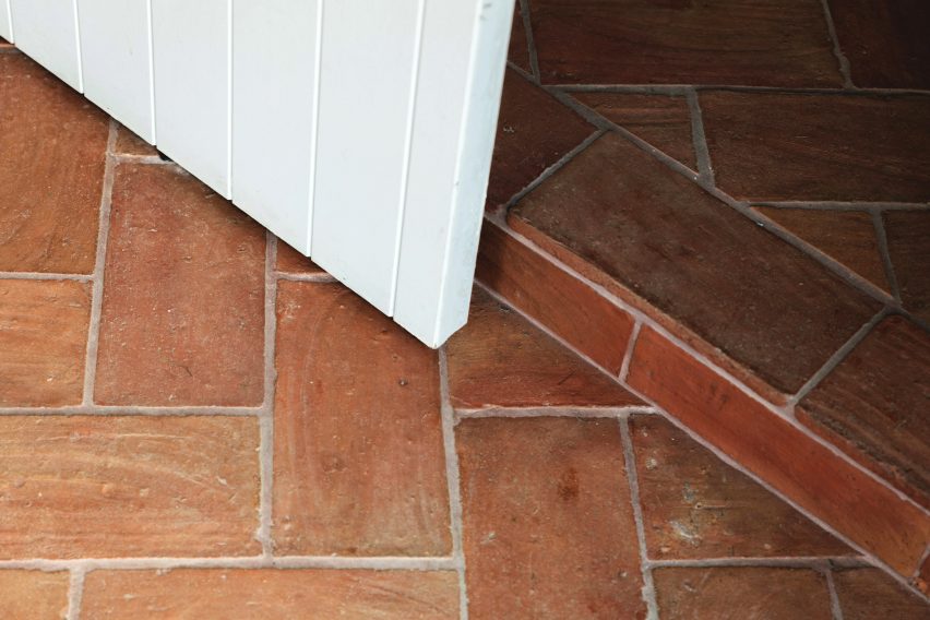 Terracotta flooring in Farley Farmhouse by Emil Eve Architects