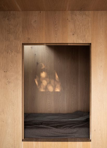Bedroom of Fjord Boat House by Norm Architects