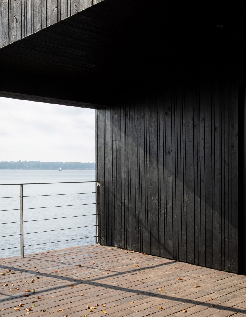 Fjord Boat House by Norm Architects features black-timber facade