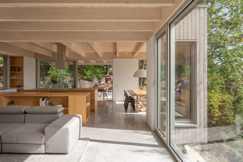 Living spaces in Forest House I by Natalie Dionne Architecture