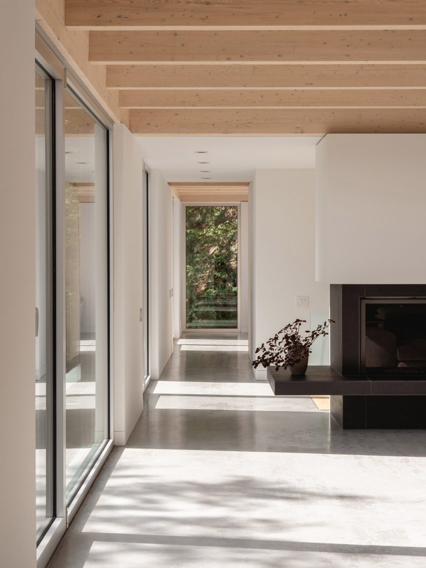Polished concrete floors in Forest House I by Natalie Dionne Architecture