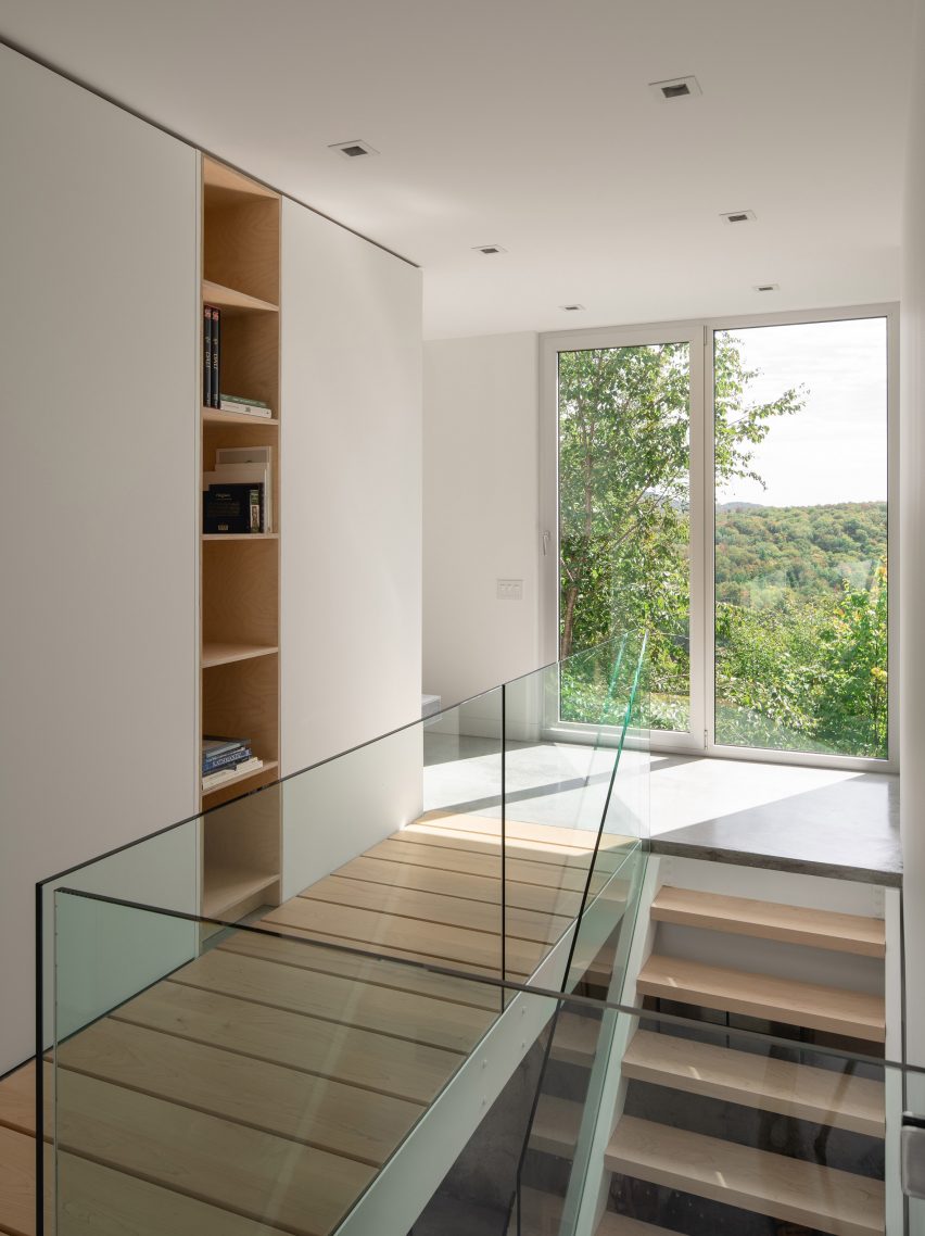 Staircase and catwalk in Bedroom in Forest House I by Natalie Dionne Architecture