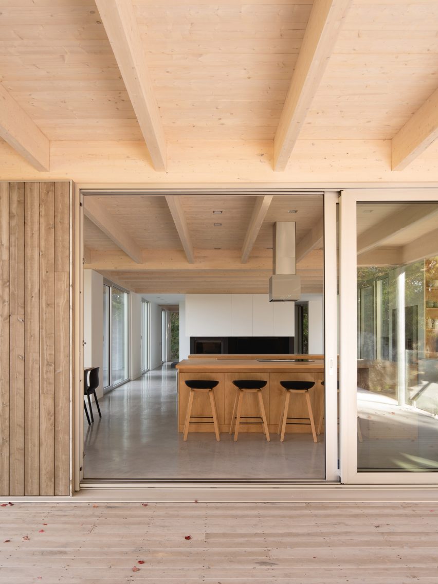 View to kitchen of Forest House I by Natalie Dionne Architecture