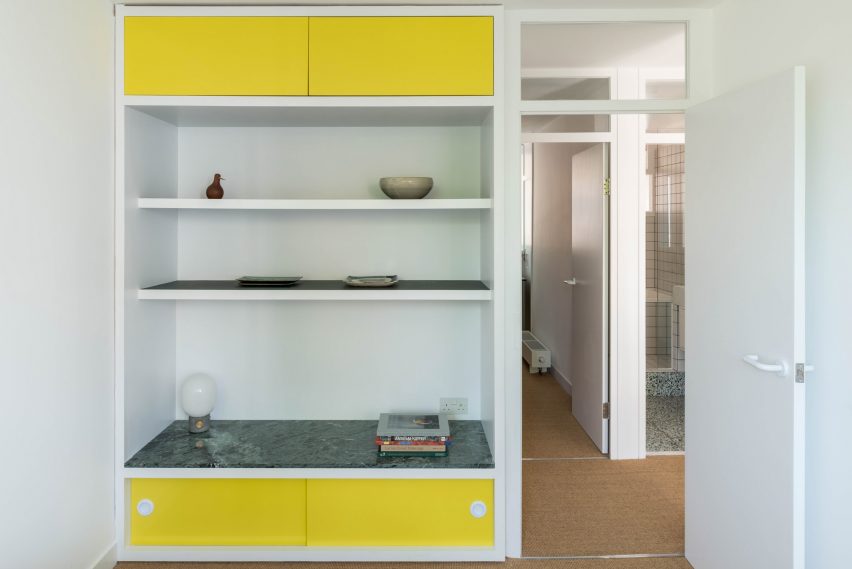 Bedroom shelving Golden Lane flat by Archmongers
