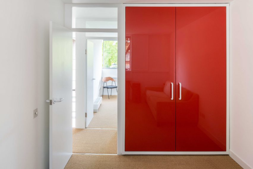 Red closet in Golden Lane flat by Archmongers