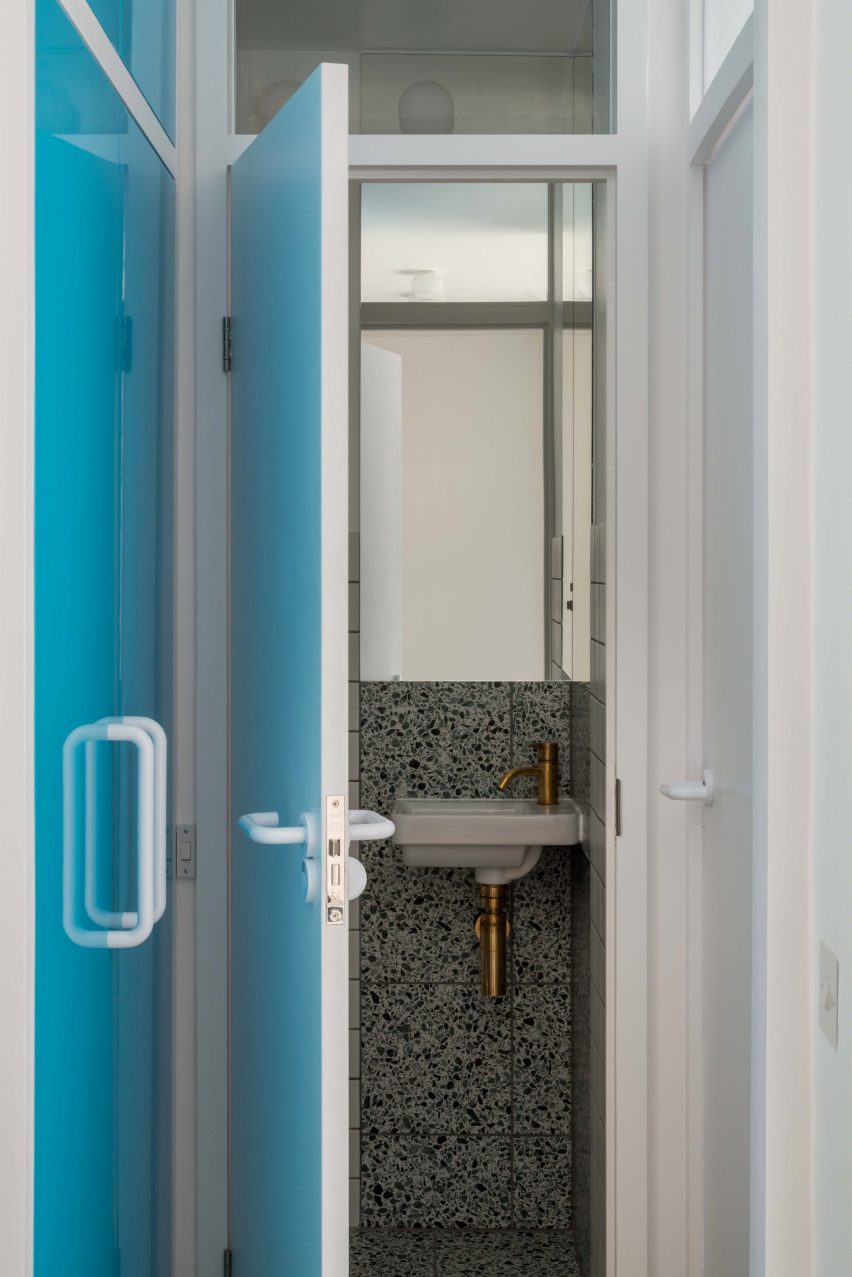 Bathroom entrance in Golden Lane flat by Archmongers
