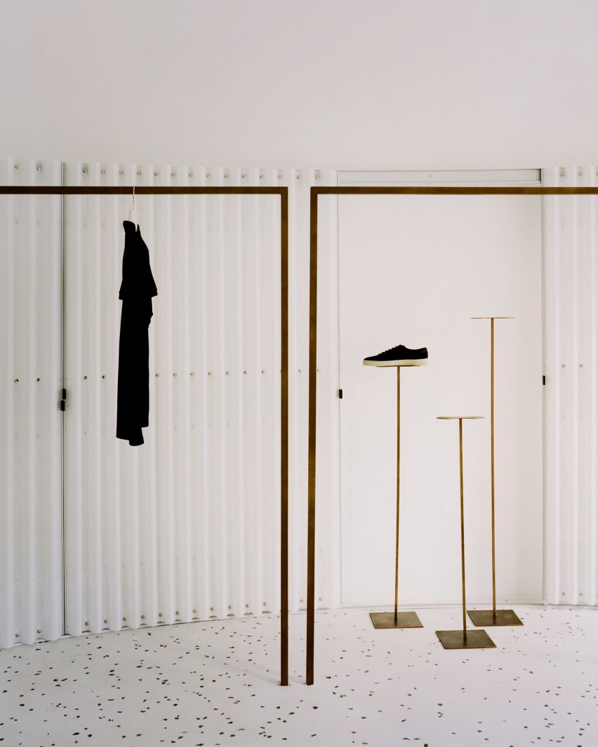 Geometric display hangers in Grifo210 boutique by Paritzki & Liani Architects