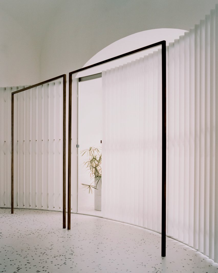 Geometric display hangers in Grifo210 boutique by Paritzki & Liani Architects
