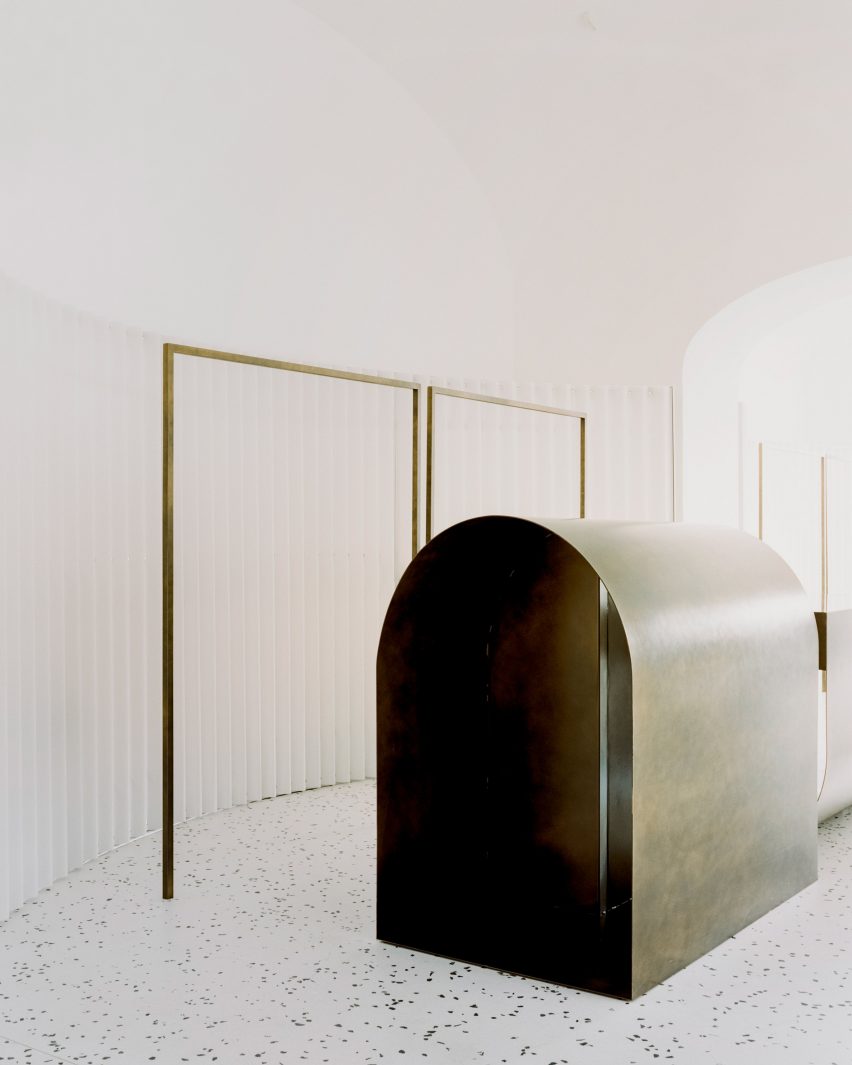 Geometric display hangers in Grifo210 boutique by Paritzki & Liani Architects