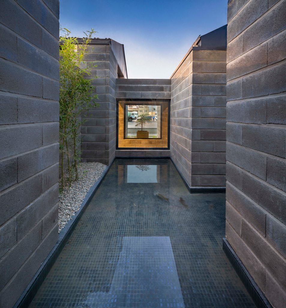 Water feature at Aptus Factory Showroom by Hooba Design Group