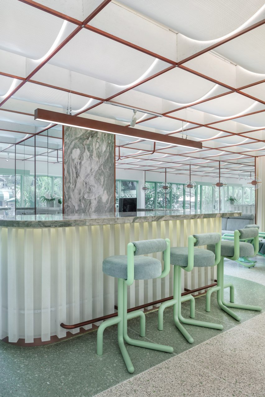 Infinity Wellbeing spa in Bangkok has calming white and green interiors