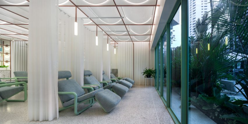 Infinity Wellbeing spa in Bangkok has calming white and green interiors