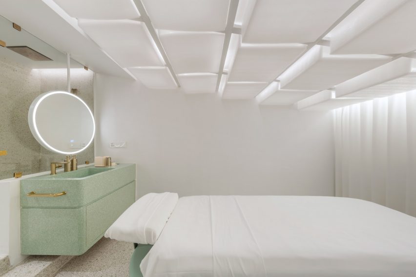 Infinity Wellbeing spa in Bangkok has calming white and green interiors