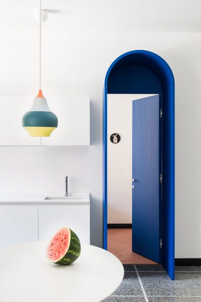 Doorway in Retroscena apartment renovation by La Macchina Studio in Rome, Italy