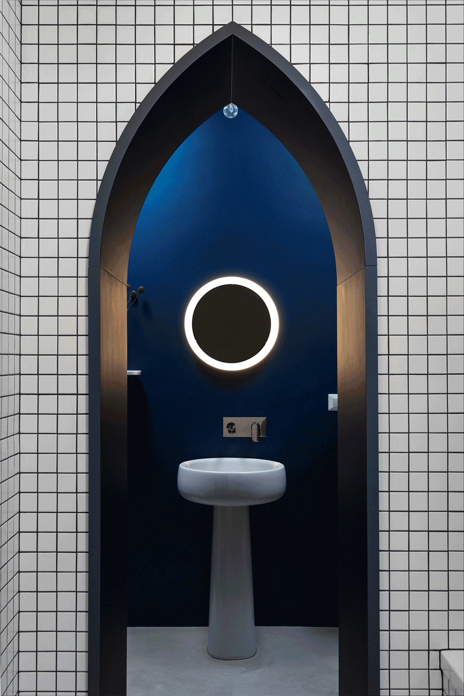 Bathroom of Retroscena apartment renovation by La Macchina Studio in Rome, Italy